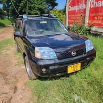 A picture of Nissan x tray milion 6 8 Ipo mwanza Automatic Engine