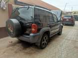 A picture of Distress liberty jeep for sale Tokunbo standard everything working perfectly