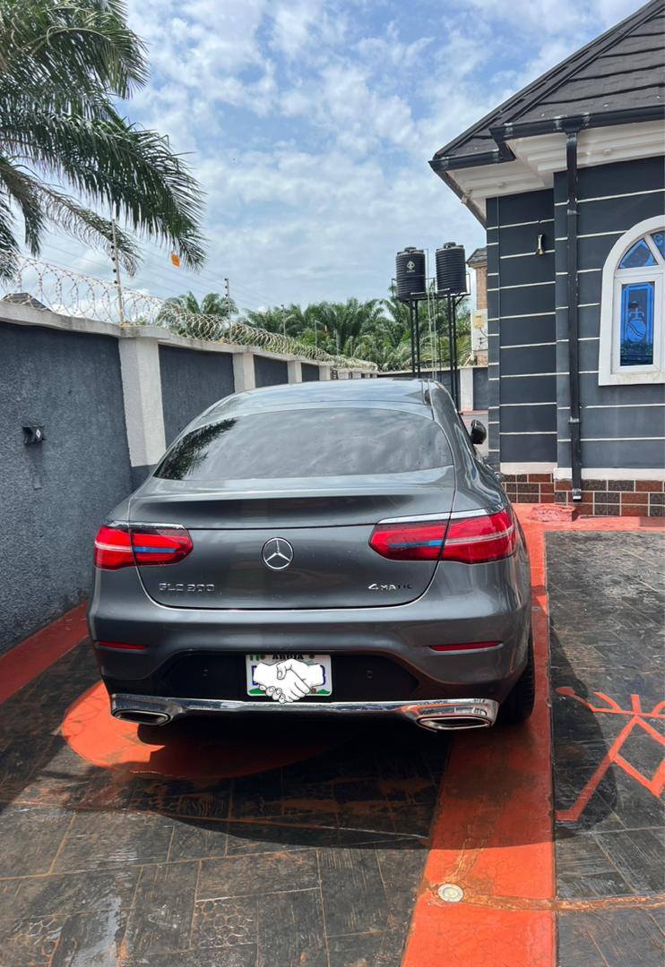 A picture of Toks standard Glc300 coupe 2018 model Red and black interior