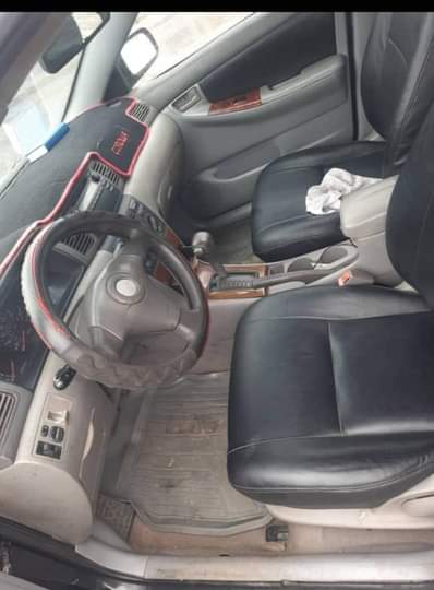 A picture of TOYOTA COROLLA 2004 ENGINE AC GEAR BODY OKAY PRICE 3M