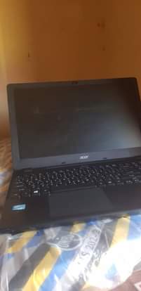 A picture of Laptop and fujifilm camera