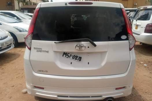 A picture of PASSO SETTE 2010 UBR 7 seater Cream Interior Installments payments