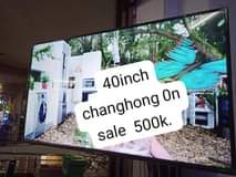 A picture of 138 ltr fridge and 40inch Tv