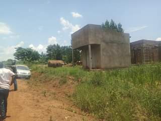 A picture of 33m 30decimals with ready land title located at matugga gombe