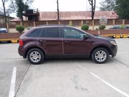 A picture of Ford edge still available Model 2010 Pure first body Clean