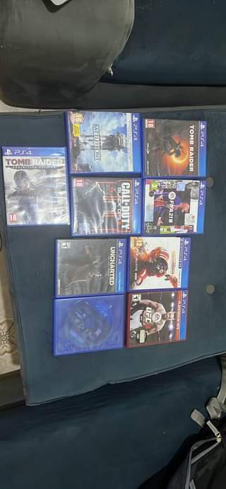 A picture of PS4 and vr with 10 games plus 2 controller ands