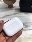 A picture of AirPods Pro original model A2084 100 wats up or call