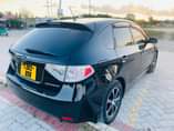 A picture of 2010 SUBARU IMPREZA 0714058883 SUBARU