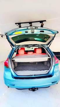 A picture of 2011 Green Registered Venza