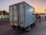A picture of ISUZU with fridge freezer