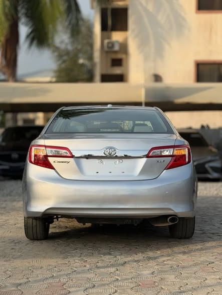 A picture of CLEAN FOREIGN USED 2013 TOYOTA CAMRY XLE IN PRISTINE CONDITION