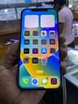 A picture of iPhone 12pro max 128gb Very good battery Working Face ID