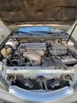 A picture of 2004 Toyota Camry XLE 4plugs Engine Extremely clean in and