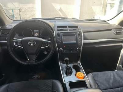 A picture of Extremely clean Toyota Camry 2015 ac gear and engine in