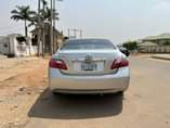 A picture of 2010 Toyota Camry XLE but 4plugs . Super clean