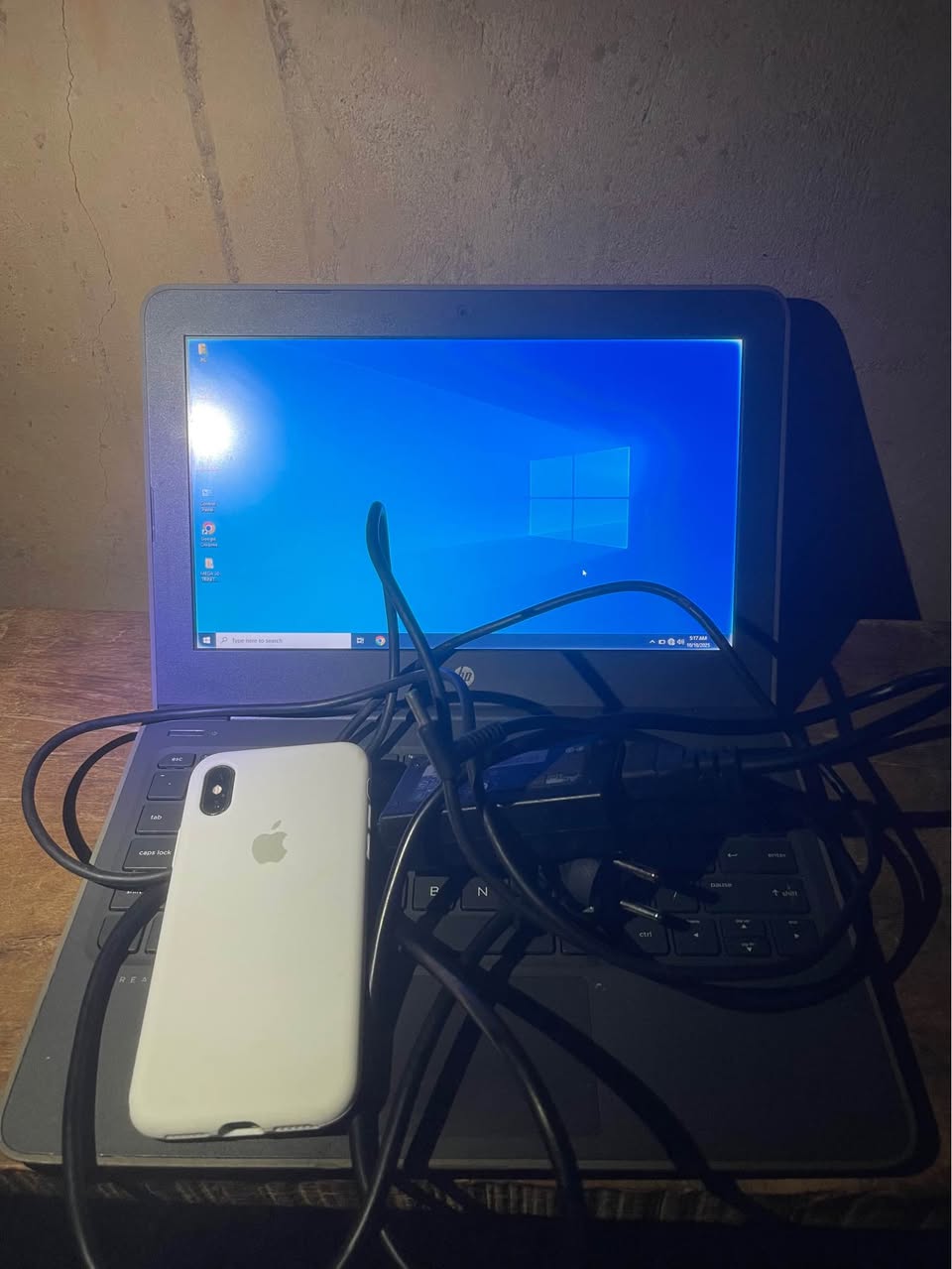A picture of Selling my iPhone X 64Gb Wifi only and hp laptop
