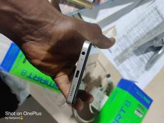 A picture of Inifinix smart 8 with full accessories no single fault selling