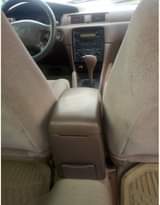 A picture of Toks green toyota camry tiny light extremly clean lagos cleared