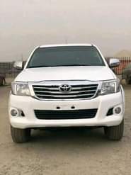 A picture of PRE OWNED Super Clean 2014 Barely Driven Toyota Hilux With
