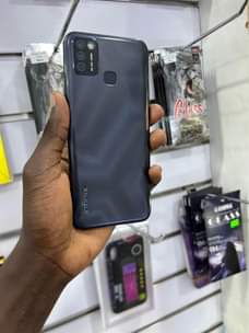 A picture of Infinix smart 6 32gb 2gb ram 220k only WhatsApp or