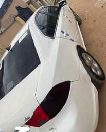 A picture of Clean Nigerian Used White Kia Optima 2009