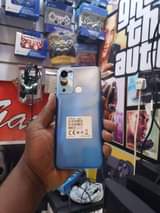 A picture of Infinix Hot 12i GB 64 ram 4 mpya fullbox bei