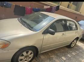 A picture of First Body Toyota corolla 2004 with a sound engine gear