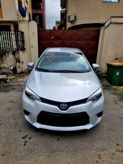 A picture of NEW ARRIVAL FOREIGN USED 2014 COROLLA With Rev Camera Bluetooth