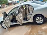 A picture of Super sharp 2004 corolla with original document now available in