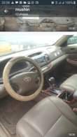 A picture of 2006 Toyota Camry painted on first body engine and gear