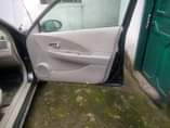 A picture of Nissan altima in good condition 4cylinder everything is working first