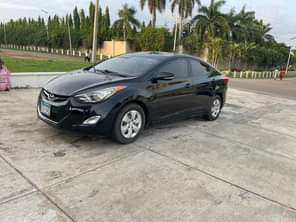 A picture of NEATLY USED HYUNDAI ELANTRA 2013 MODEL WITH ORIGINAL DUTY AT