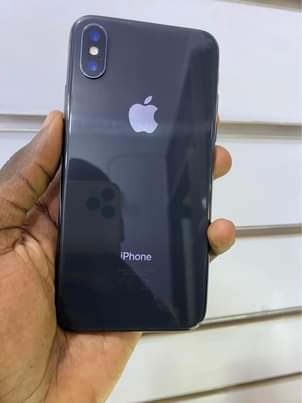 A picture of iPhone X 256gb faceid working 770k WhatsApp or call 0759979422