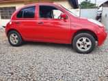 A picture of Nissan march 5 5M ipo mwanza