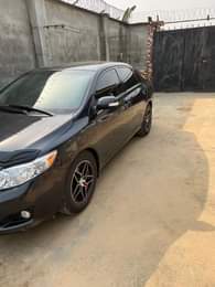 A picture of Neatly used Belgium Grade 2010 Corolla Andriod screen Engine untouched