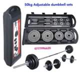A picture of 50 KG chrome barbell and dumbbell set Price 600 000