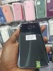 A picture of Samsung s7 double line an 280 slightly negotiable 0755656909 available