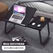 A picture of Foldable and portable laptop desk or WhatsApp 0784884323