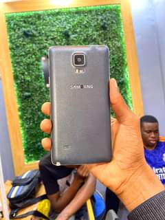 A picture of SAMSUNG NOTE 4 storage gb32 Ram 3 Iko safi Nipo