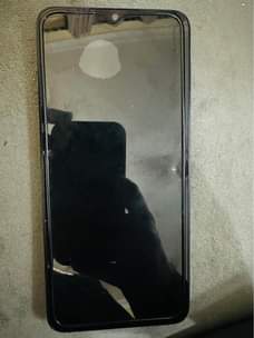 A picture of Redmi phone in good condition used for a week