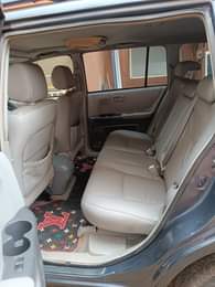 A picture of CLEANINESS PLUS GODLINESS IN A VEHICLE 3ROWS super clean and