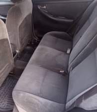 A picture of JUST IN Clean Nigerian Used White Toyota Corolla 2004 Baked