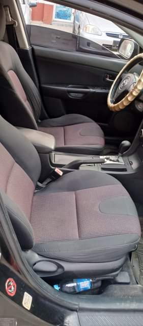 A picture of Mazda 3 salon 2003 model AC engine and gear box