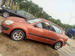 A picture of Kia rio 2009 Engine AC chilling perfect first body interior