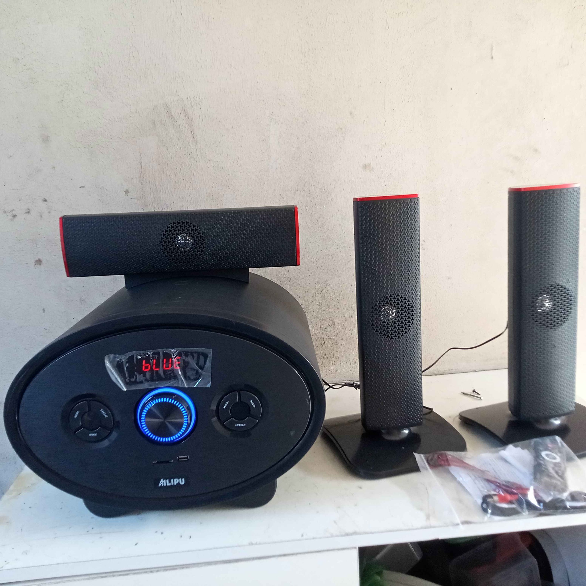 A picture of ALIPU 3.1 subwoofer. 3.1 Channel HOME THEATER SYSTEM