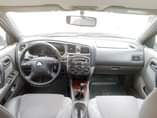 A picture of Nissan Primera 2002 03 model 4 plugs Manual Transmission Uber