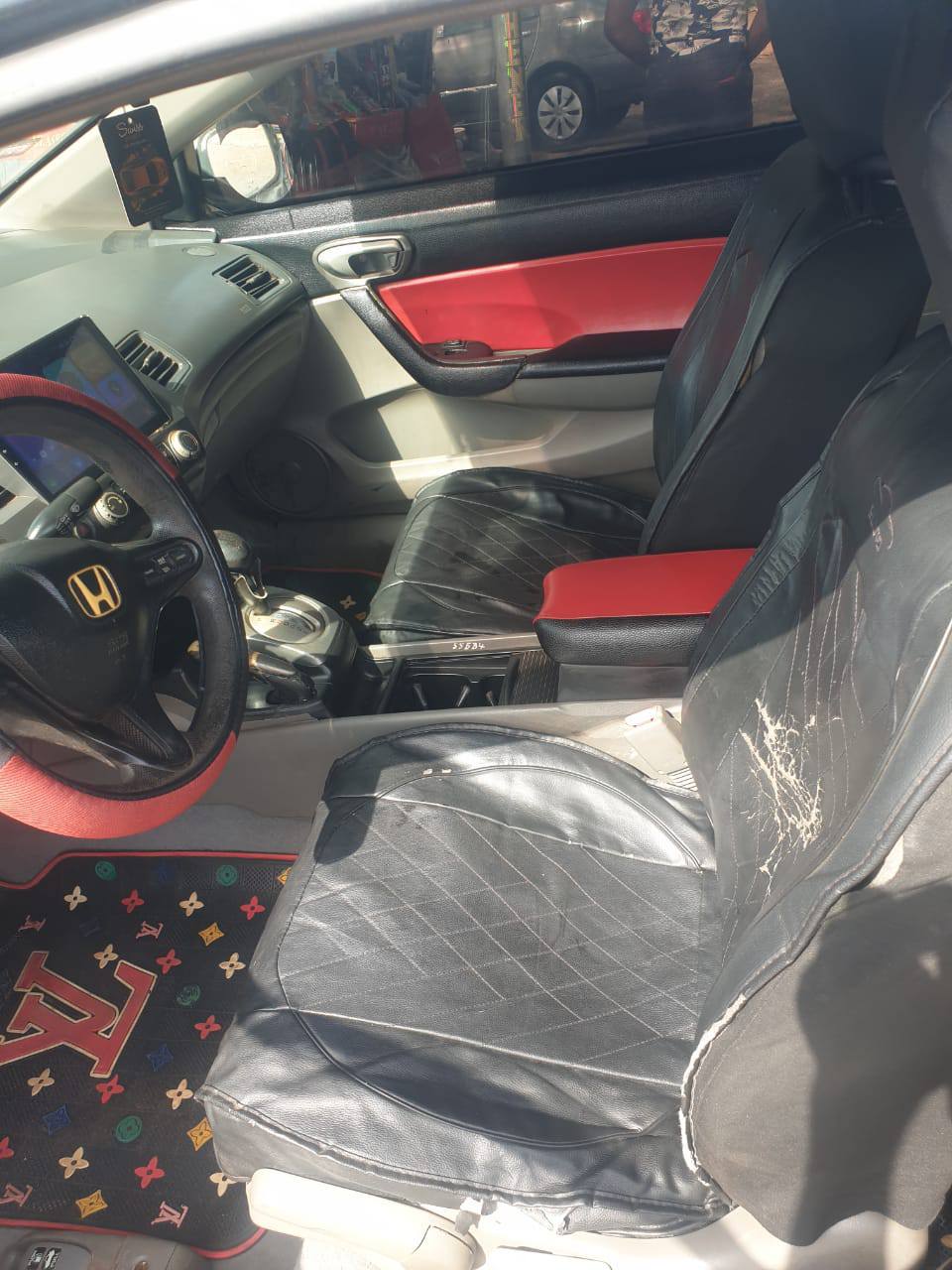 A picture of Honda civic one door sound and silent untempered engine and
