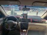 A picture of Sharp Belgium grade first body 2007 Toyota Corolla sound four
