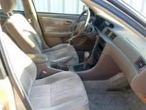 A picture of 1998 Toyota Camry LE Gold factory AC first body sound