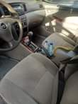 A picture of 2008 Toyota Corolla barely few months driven First body very
